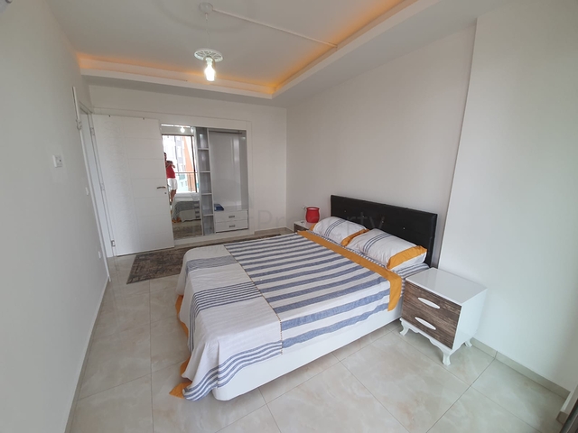 Двухкомнатная меблированная квартира в Махмутларе