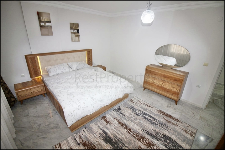 Трехкомнатная квартира с красивой мебелью в районе Махмутларе 