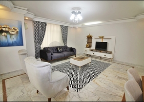 Трехкомнатная квартира с красивой мебелью в районе Махмутларе 