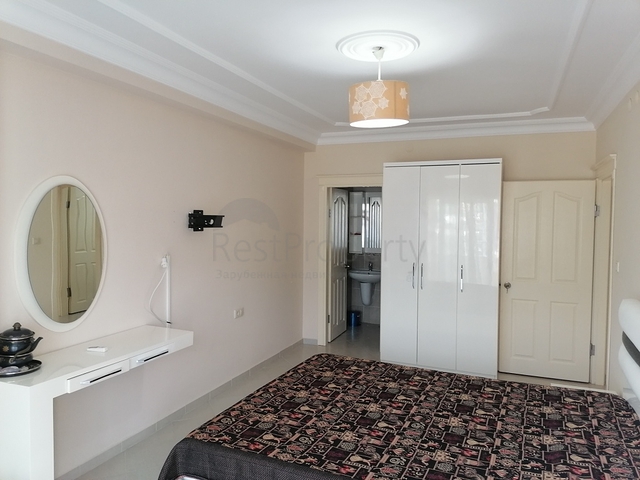 Трехкомнатная квартира с видом на море и горы в районе Махмутлар, Алания