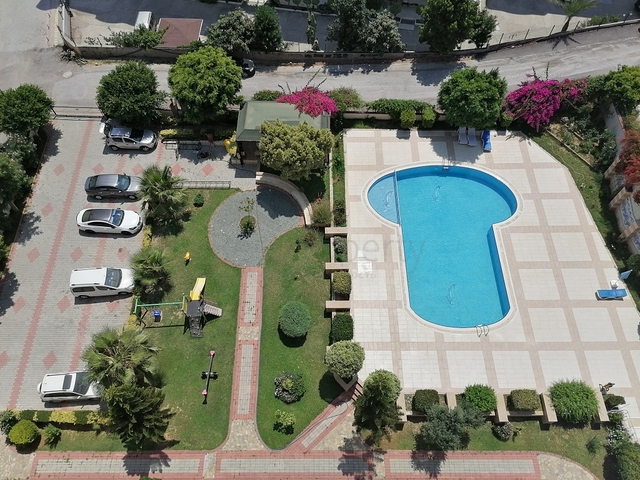 Трехкомнатная квартира с видом на море и горы в районе Махмутлар, Алания