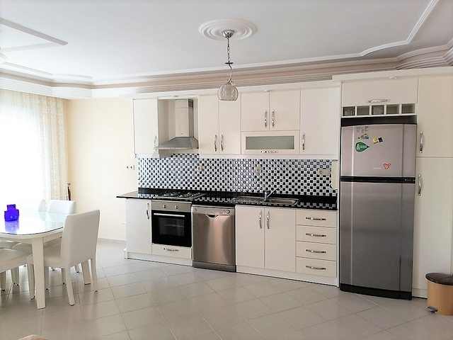 Трехкомнатная квартира с видом на море и горы в районе Махмутлар, Алания