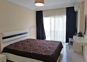 Трехкомнатная квартира с видом на море и горы в районе Махмутлар, Алания