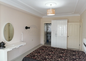 Трехкомнатная квартира с видом на море и горы в районе Махмутлар, Алания