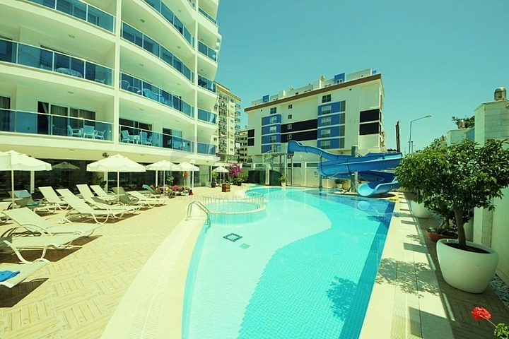 Двухкомнатная квартира в центре района Махмутлар 