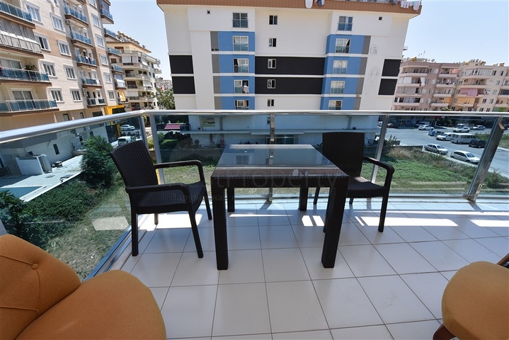 Двухкомнатная квартира в центре района Махмутлар 