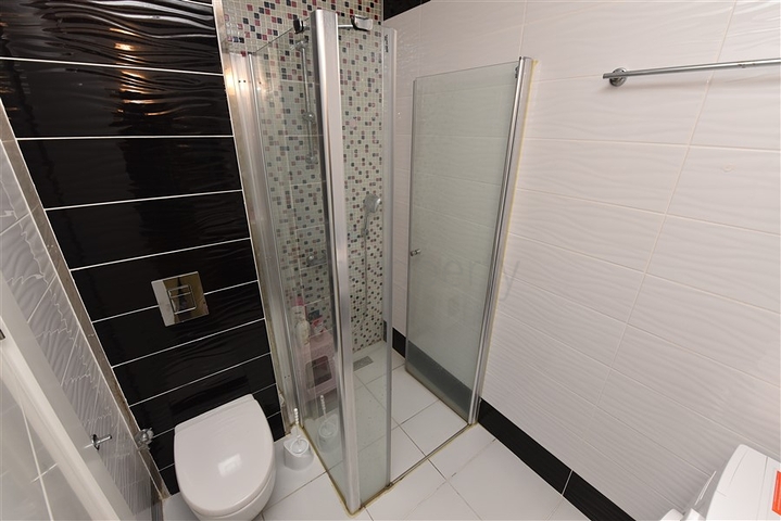 Двухкомнатная квартира в центре района Махмутлар 