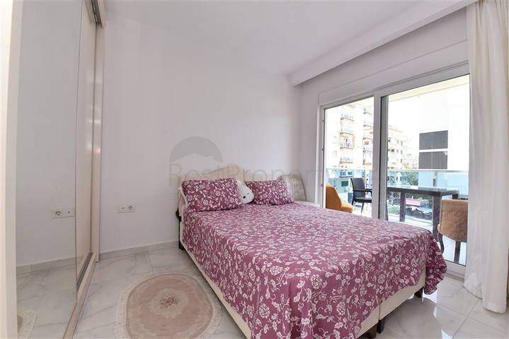 Двухкомнатная квартира в центре района Махмутлар 