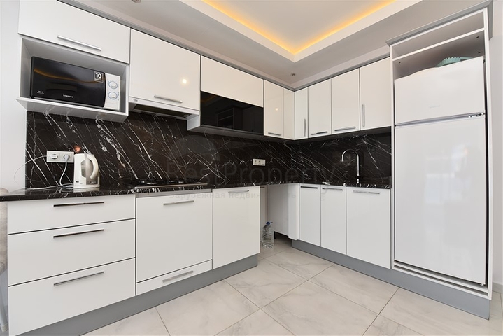 Двухкомнатная квартира в центре района Махмутлар 