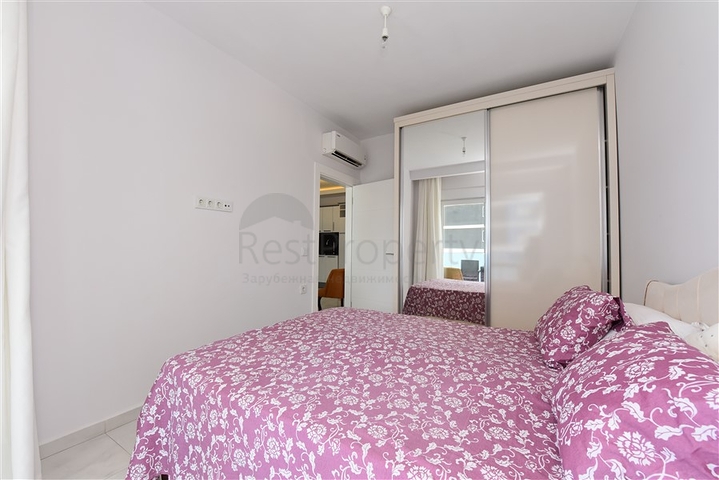 Двухкомнатная квартира в центре района Махмутлар 