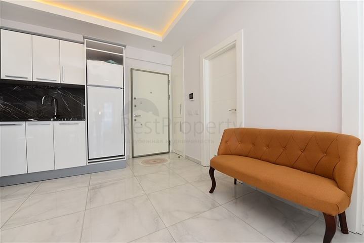 Двухкомнатная квартира в центре района Махмутлар 