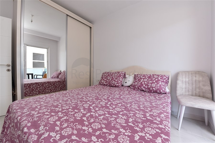 Двухкомнатная квартира в центре района Махмутлар 