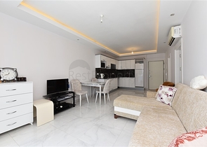 Двухкомнатная квартира в центре района Махмутлар 