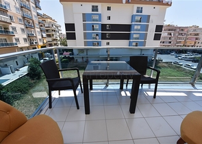 Двухкомнатная квартира в центре района Махмутлар 