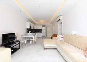 Двухкомнатная квартира в центре района Махмутлар 