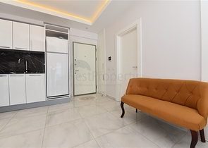 Двухкомнатная квартира в центре района Махмутлар 