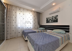 Меблированная квартира с отельной инфраструктурой в Авсалларе 