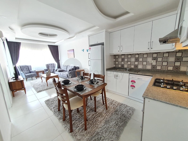 Меблированная двухкомнатная квартира в Махмутларе