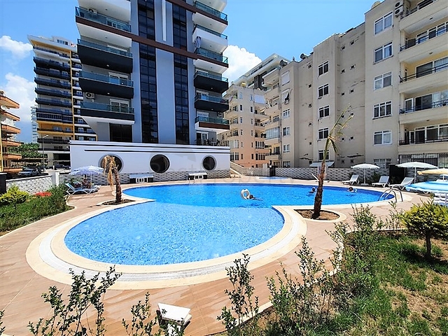 Меблированная двухкомнатная квартира в Махмутларе