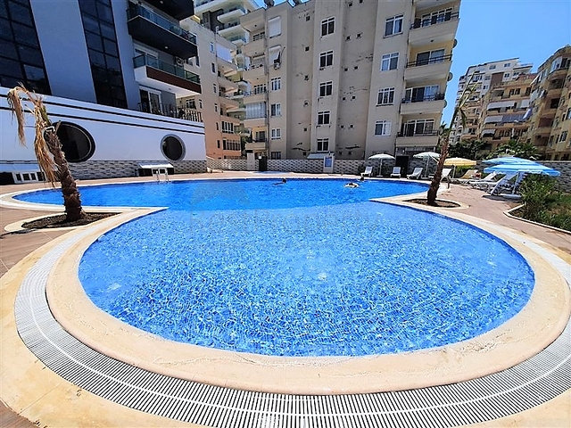 Меблированная двухкомнатная квартира в Махмутларе