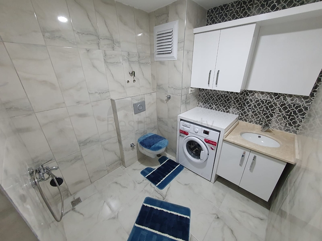 Меблированная двухкомнатная квартира в Махмутларе