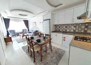 Меблированная двухкомнатная квартира в Махмутларе