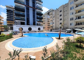 Меблированная двухкомнатная квартира в Махмутларе