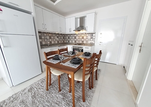 Меблированная двухкомнатная квартира в Махмутларе