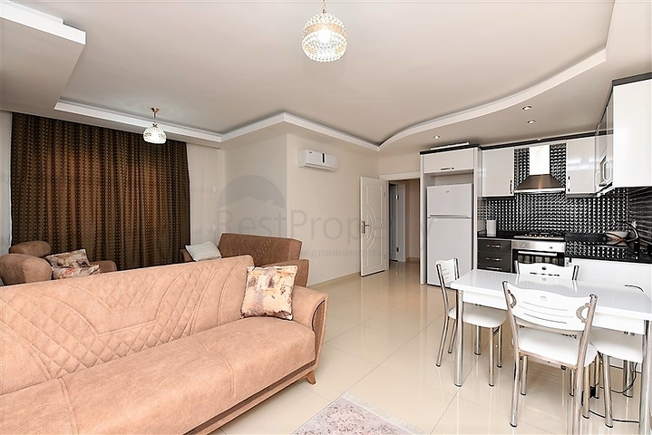 Меблированная квартира планировкой 1+1 в русскоязычном районе Махмутлар