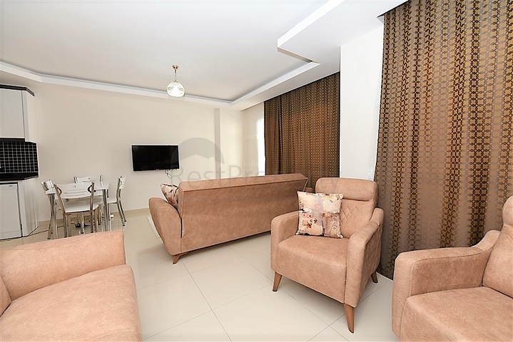 Меблированная квартира планировкой 1+1 в русскоязычном районе Махмутлар