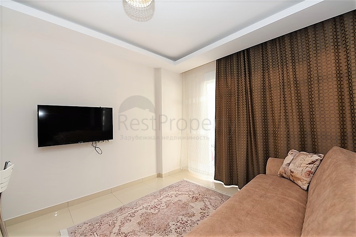 Меблированная квартира планировкой 1+1 в русскоязычном районе Махмутлар