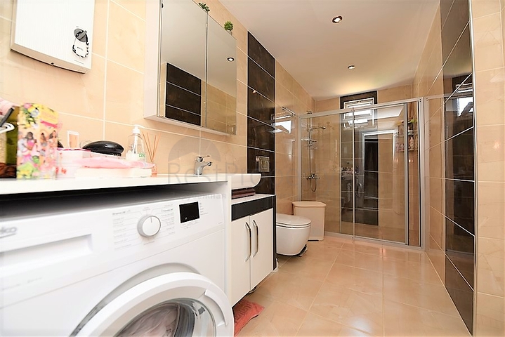 Меблированная квартира планировкой 1+1 в русскоязычном районе Махмутлар