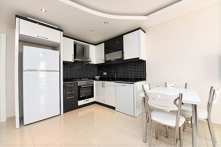 Меблированная квартира планировкой 1+1 в русскоязычном районе Махмутлар