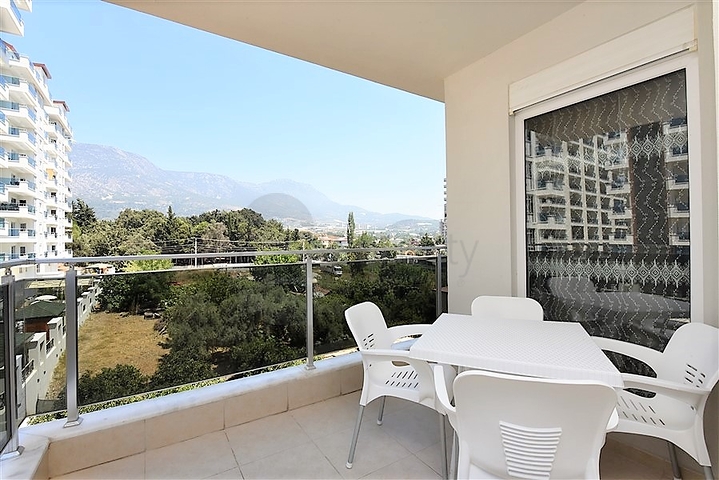 Меблированная квартира планировкой 1+1 в русскоязычном районе Махмутлар