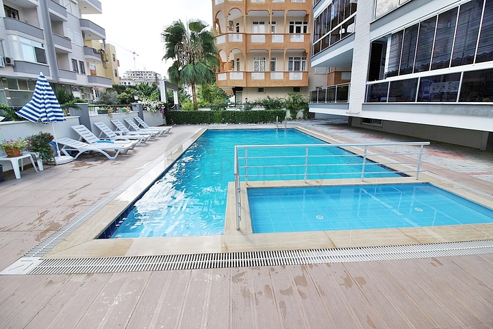 Меблированная квартира планировкой 1+1 в русскоязычном районе Махмутлар