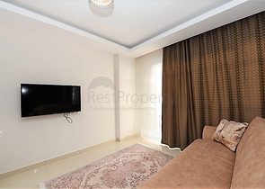 Меблированная квартира планировкой 1+1 в русскоязычном районе Махмутлар