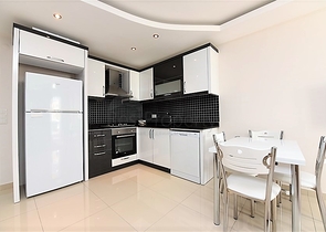 Меблированная квартира планировкой 1+1 в русскоязычном районе Махмутлар