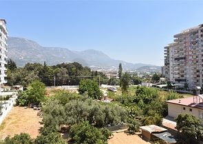 Меблированная квартира планировкой 1+1 в русскоязычном районе Махмутлар