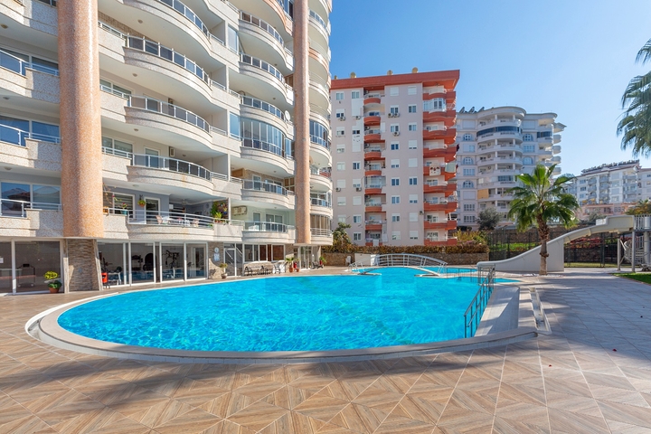 Квартира планировки 2+1 в благоустроенном комплексе в районе Тосмур