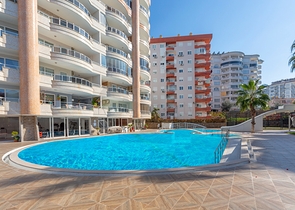 Квартира планировки 2+1 в благоустроенном комплексе в районе Тосмур