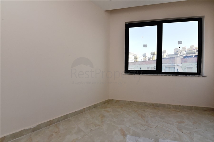 Трёхкомнатная квартира в новом доме в центре Алании