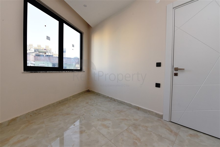 Трёхкомнатная квартира в новом доме в центре Алании