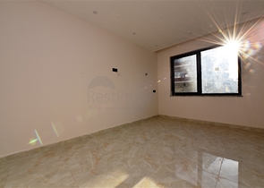 Трёхкомнатная квартира в новом доме в центре Алании