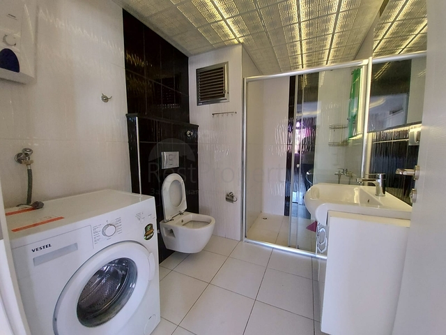 Меблированные апартаменты планировкой 1+1 в районе Махмутлар