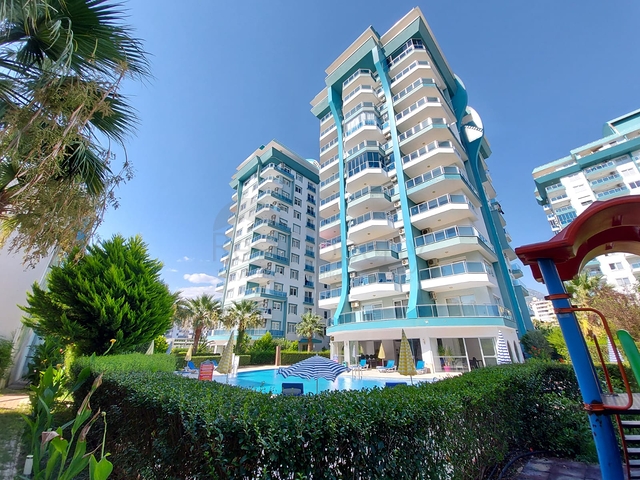 Меблированные апартаменты планировкой 1+1 в районе Махмутлар