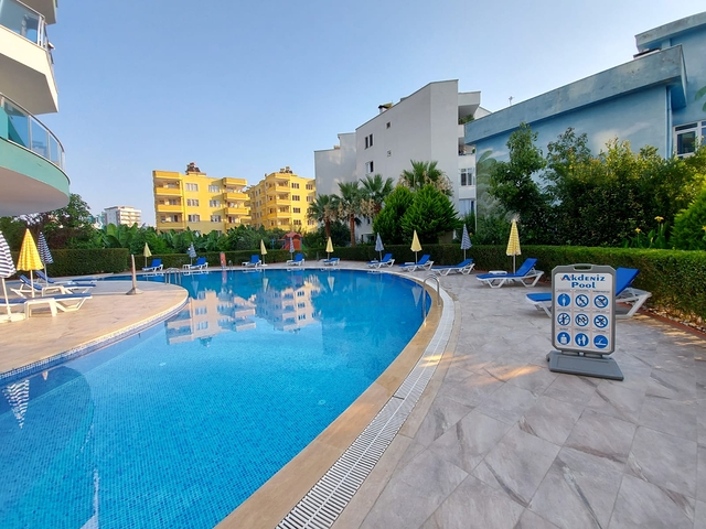 Меблированные апартаменты планировкой 1+1 в районе Махмутлар