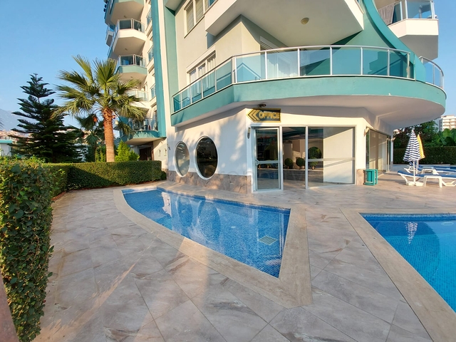 Меблированные апартаменты планировкой 1+1 в районе Махмутлар