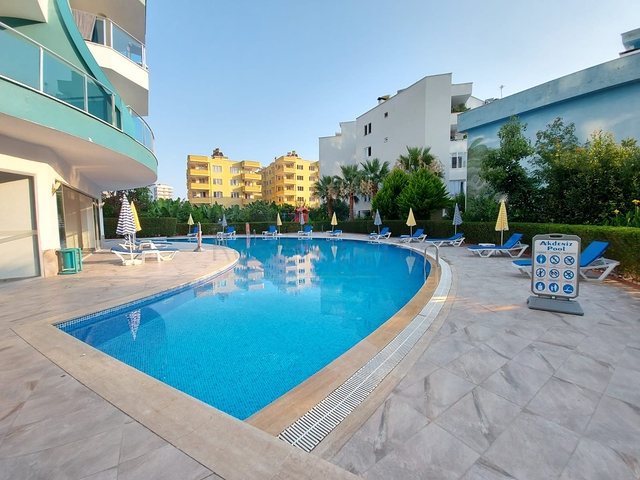 Меблированные апартаменты планировкой 1+1 в районе Махмутлар