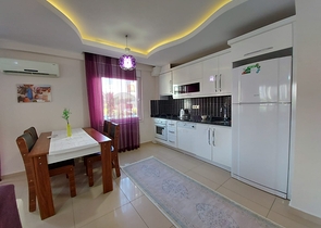 Меблированные апартаменты планировкой 1+1 в районе Махмутлар