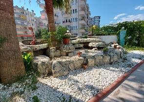 Меблированные апартаменты планировкой 1+1 в районе Махмутлар